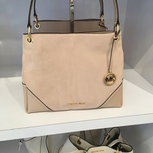 Nicole medium shoulder bag.
